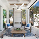 White 8-blade ceiling fan with integrated LED light installed on a covered outdoor patio