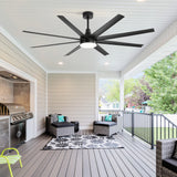 AeroSpan Lux 72-inch large black 8-blade ceiling fan with LED light installed on a covered outdoor patio