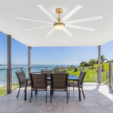 White and gold AeroSpan Lux ceiling fan with LED light installed on a covered oceanfront patio