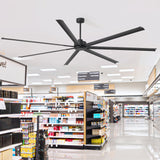 AeroSpan XL large black ceiling fan installed in a spacious retail store for wide-area air circulation