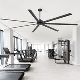 AeroSpan XL large black ceiling fan installed in a modern gym, providing wide-area airflow for spacious interiors