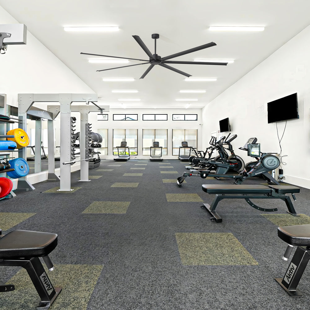AeroSpan XL large ceiling fan installed in a spacious gym for powerful air circulation and cooling