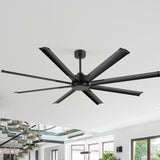 Black 72-inch 8-blade aluminum industrial ceiling fan installed above a modern open-plan interior with staircase