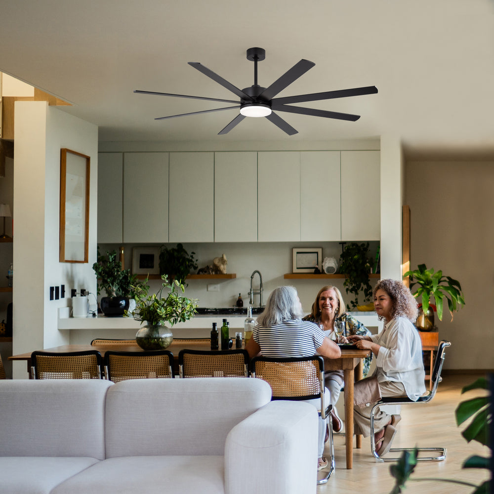 Open dining room table and kitchen shelves beneath Luminor 72-inch black 8-blade ceiling fan