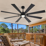 Jovora 72-inch large black 8-blade ceiling fan with light on a covered patio featuring wood railing and outdoor seating