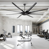 AeroSpan-XL 84/100-inch large black ceiling fan installed in a spacious gym