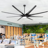 AeroSpan-XL large black ceiling fan with integrated LED light installed in a modern restaurant