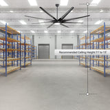 Large black industrial ceiling fan with LED light installed in a warehouse, recommended for 11 to 13 ft ceilings