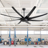 AeroSpan-XL large black ceiling fan installed in an automotive workshop