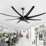 AeroSpan-XL large black ceiling fan with remote control installed in a laboratory workspace