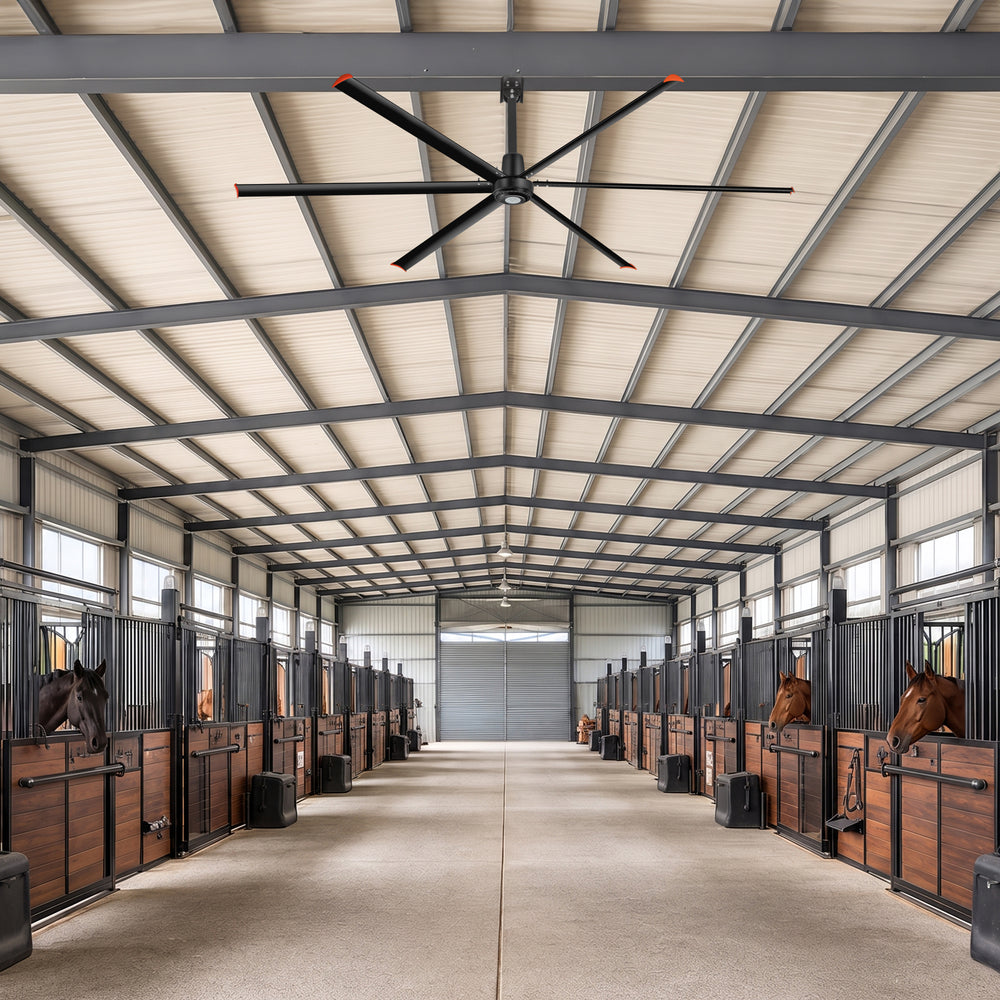 Black AeroSpan 12FT 144-inch HVLS industrial ceiling fan installed in a horse stable