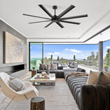 72-inch black 8-blade aluminum industrial ceiling fan installed in a modern living room with panoramic city views