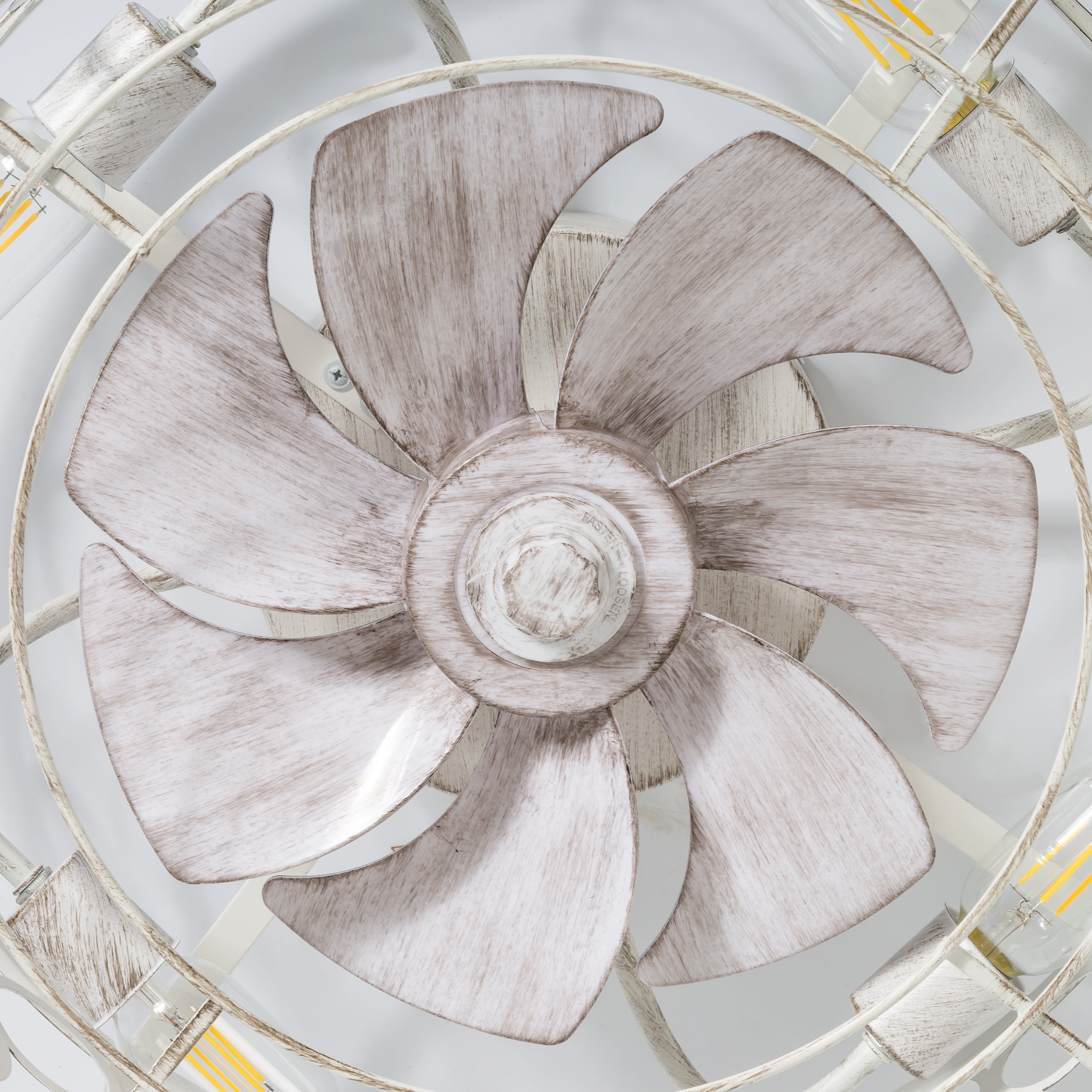 Close view of Greyora seven enclosed ceiling fan blades inside the cage