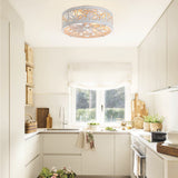 Arachne 16.5-inch vintage white flush mount ceiling fan with light installed in a bright modern kitchen.