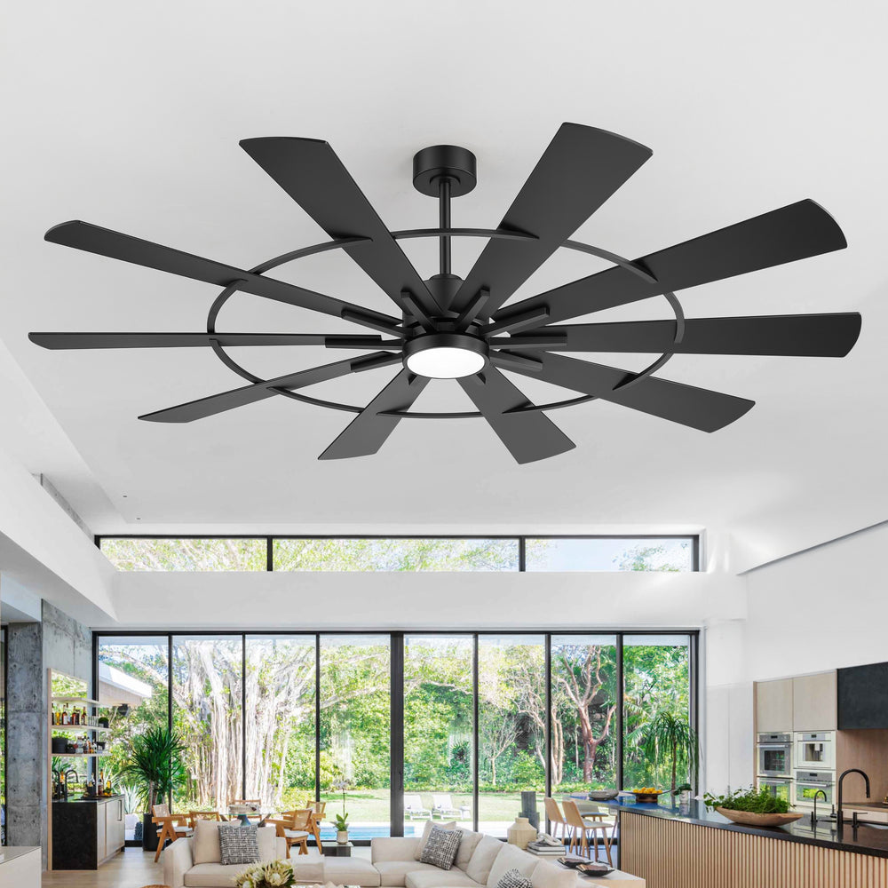 Large modern black ceiling fan with light installed in an open living room