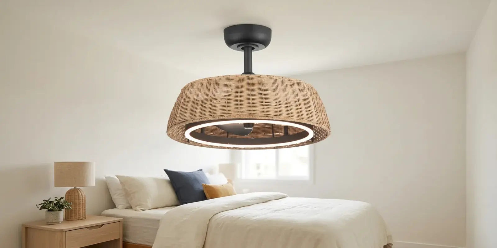Boho rattan ceiling fan with light and remote installed above a modern bedroom