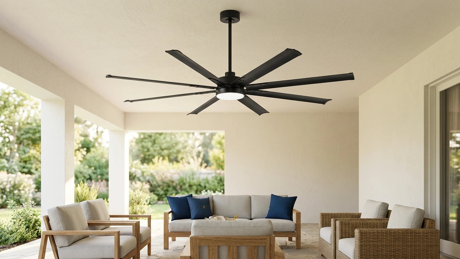 outdoor aluminum blade ceiling fan with light installed beneath a covered residential patio