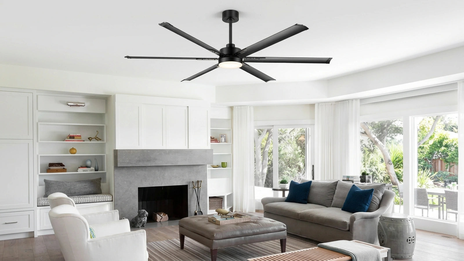 modern aluminum blade ceiling fan with light installed in a residential living room