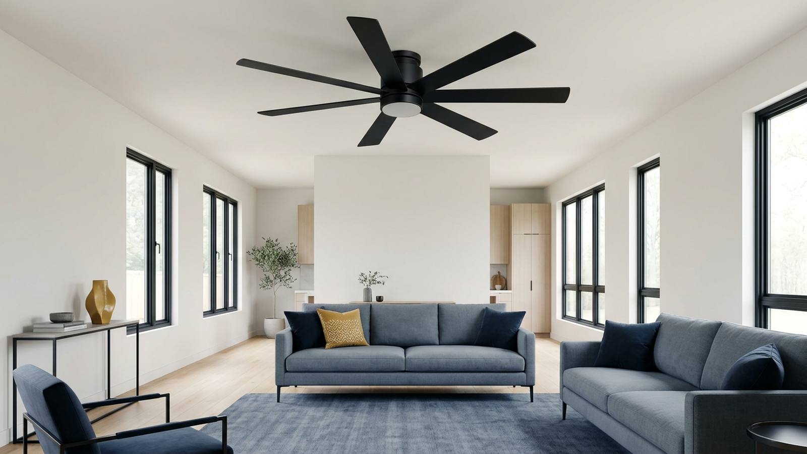 Matte black large low profile ceiling fan in a modern interior with coordinated material finishes