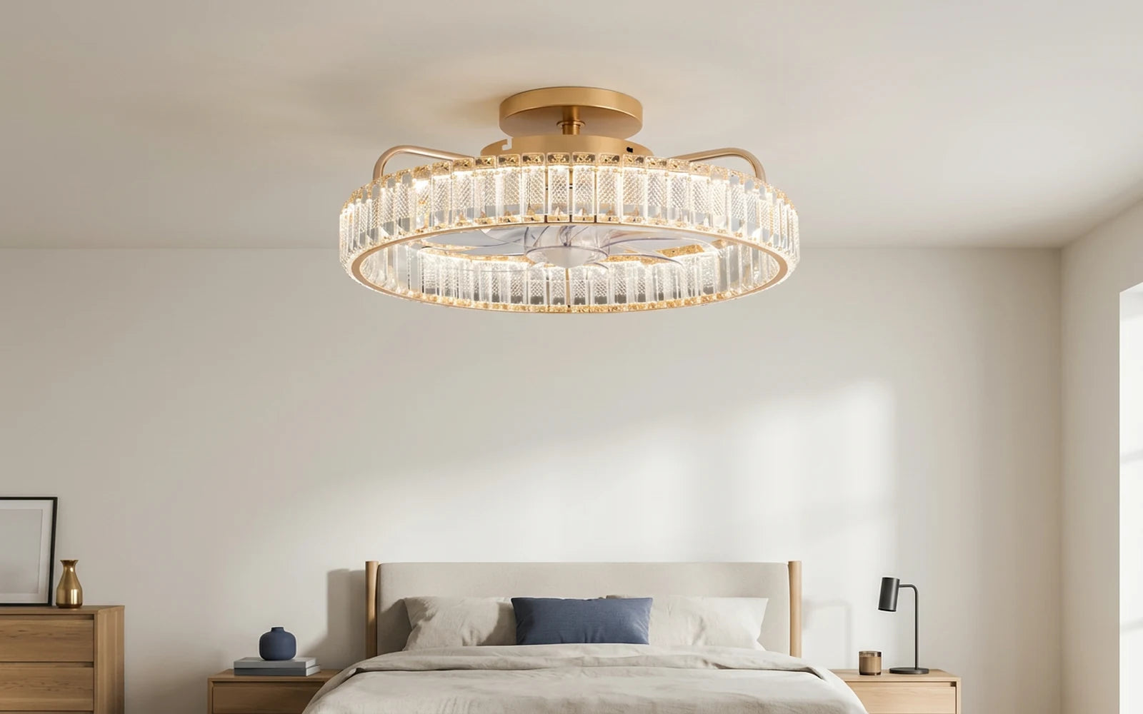 Gold low-profile flush mount ceiling fan with light installed in a modern bedroom