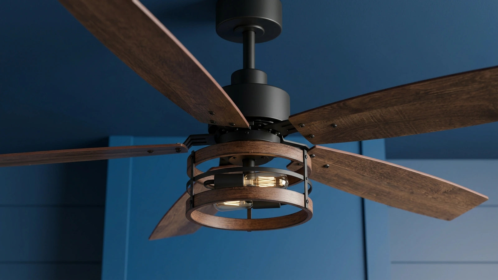 Close view of the central cage-style light on Breezary 29018-BK large caged ceiling fan