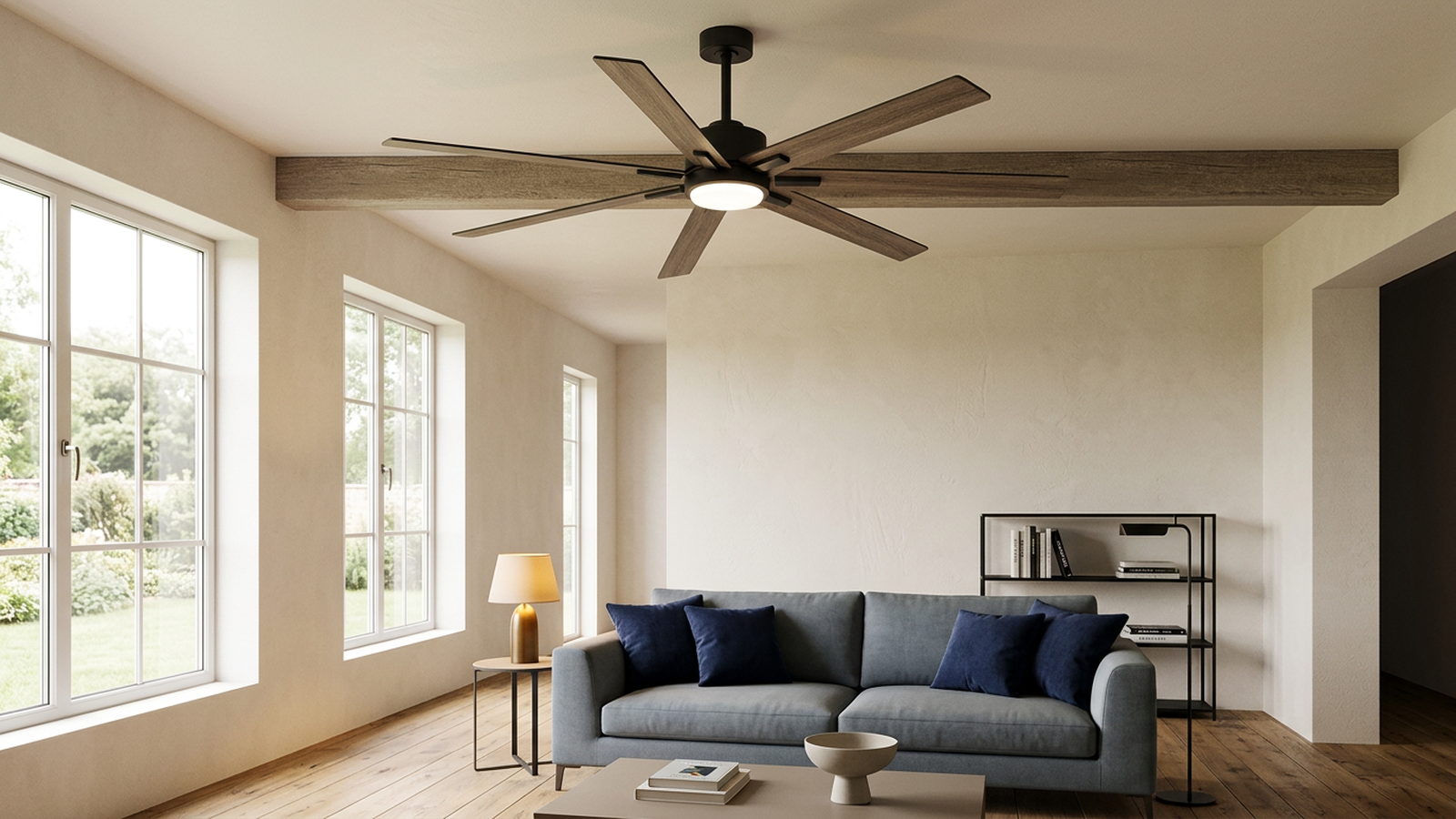 Modern black ceiling fan with warm wood-grain blades in a transitional living room