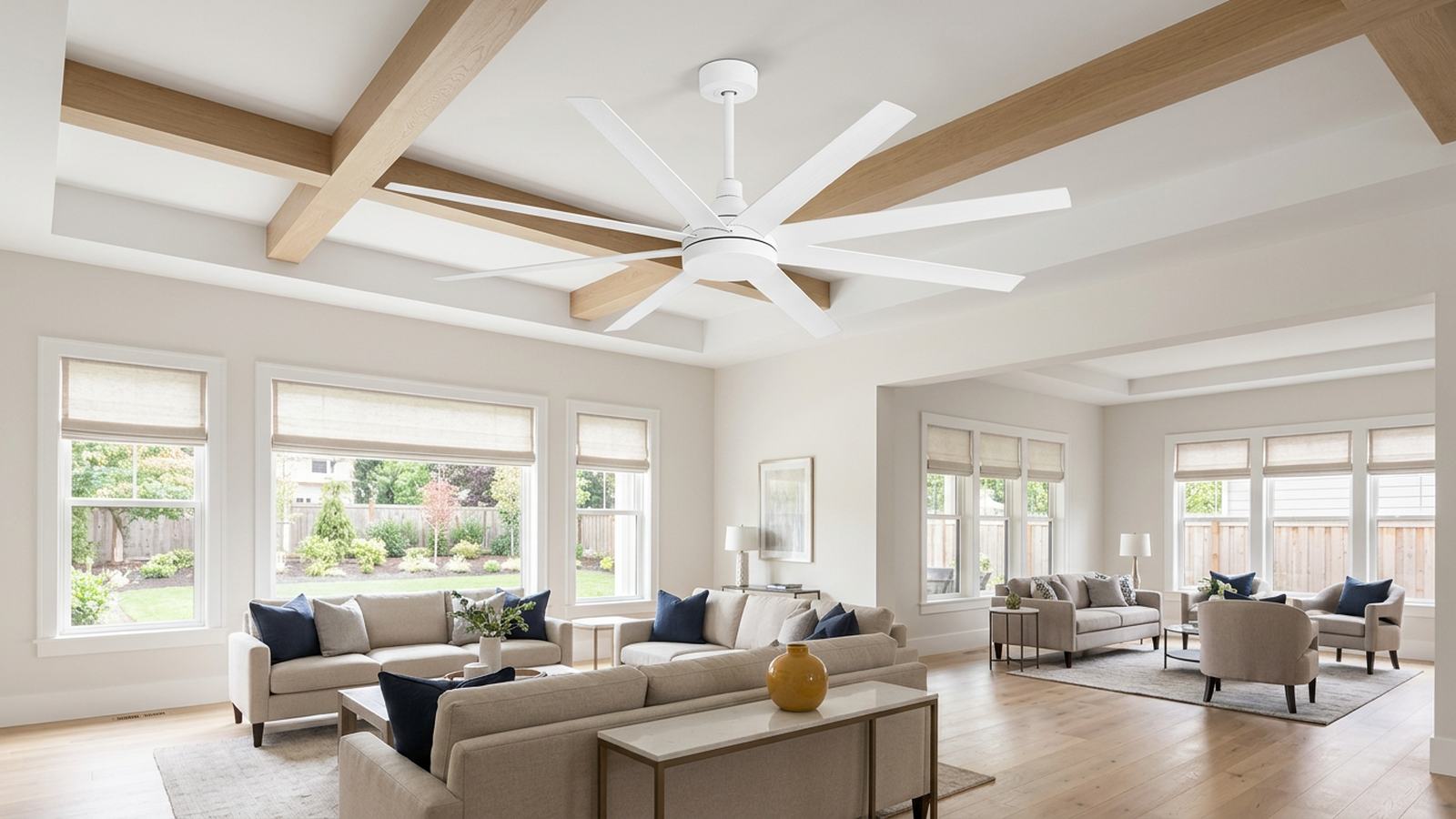 Large white fan in an open great room and family room