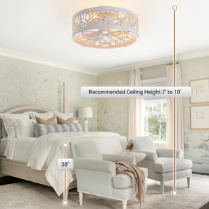Vintage white flush mount ceiling fan with light in a bedroom