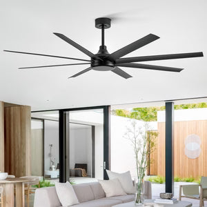 Large black 8-blade ceiling fan in an open living space